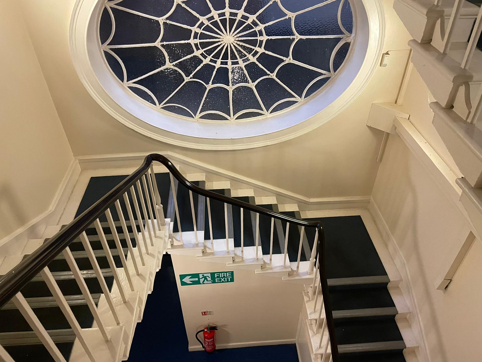 Historic stair and feature window at The George